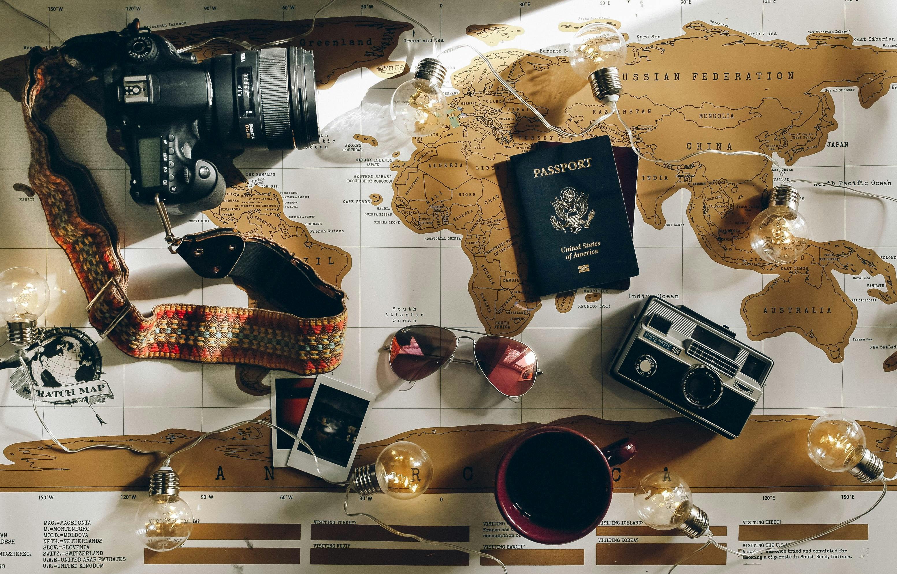 A traveler planning a journey with a map
